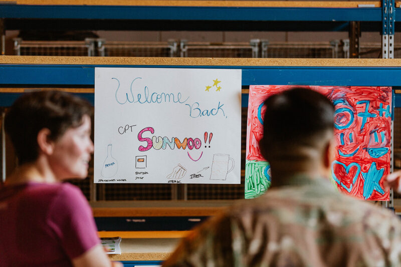 Welcome home signs at the Rhineland Ordnance Barracks for Kaiserslautern homecoming photos in Germany