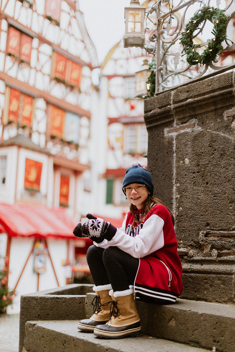 A girl poses for these Bernkastel-Kues Christmas mini sessions near Kaiserslautern, Germany