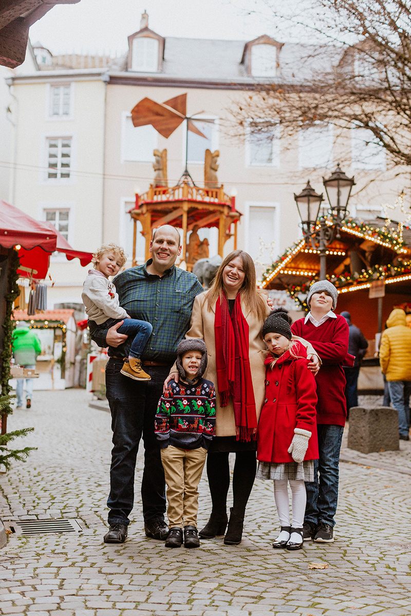 A family poses for these Bernkastel-Kues Christmas mini sessions near Kaiserslautern, Germany
