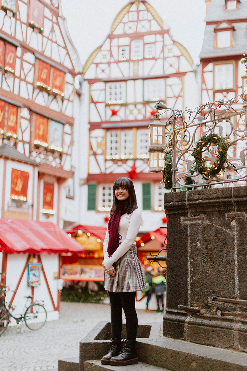 A young girl poses for these Bernkastel-Kues Christmas mini sessions near Kaiserslautern, Germany